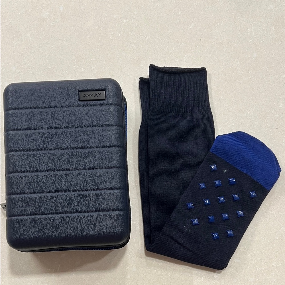 Away x United amenity bag with Black and Blue grippy Socks